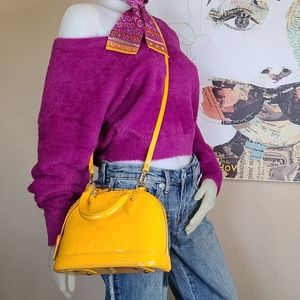 MORE PICTURES LOUIS VUITTON ALMA BB VERNIS YELLOW
